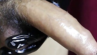 close-up cock massage with lubrication in sexy gloves