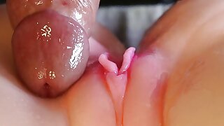 A thick cock gently and slowly penetrates inside with sweet moans