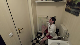 Sneaker boy sniffs his smelly sneaks and takes a shower after the gym