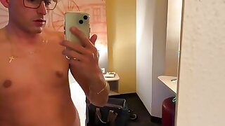 Sweet German boy jerks off early in the morning in the hotel room and squirts on the bed